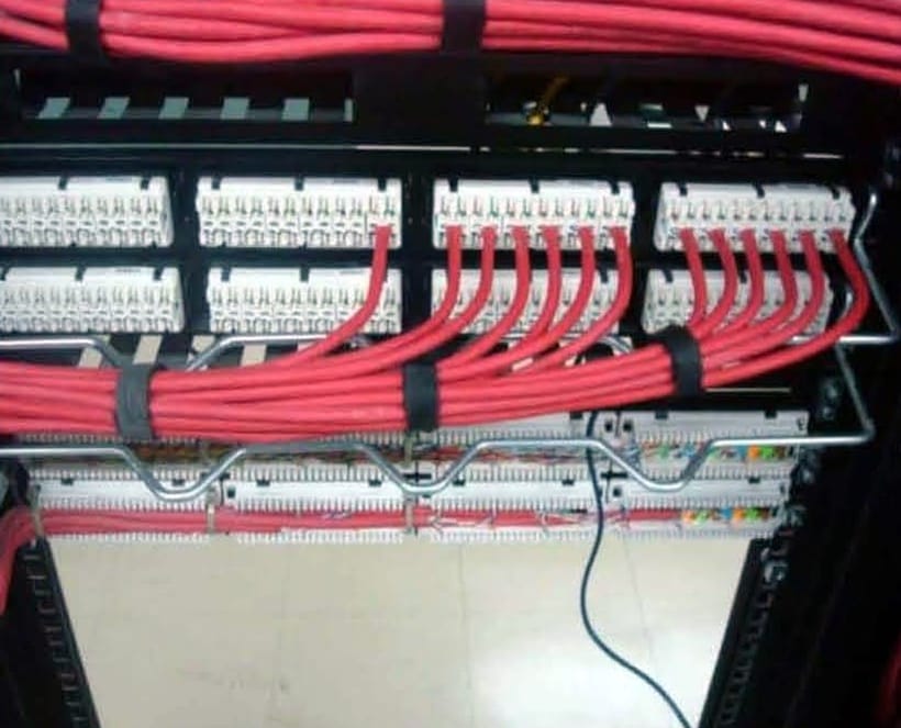 Red voice cabling terminated on KRONE punch-down blocks